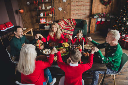 Photo of family friends small childhood grandchildren pensioner retired grandparents sit big table...