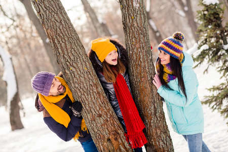 Photo of excited family mommy daddy daughter happy positive smile have fun vacation holiday walk forestの写真素材