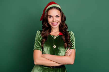 Photo of young cheerful girl happy positive smile folded hands noel holiday spirit isolated over...