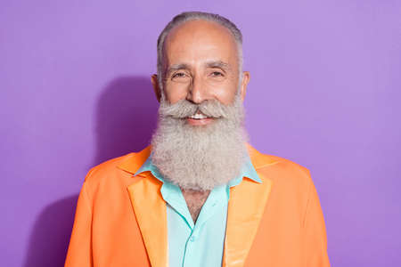 Photo of old charming cheerful man wear beard smile good mood enjoy isolated on purple violet color...
