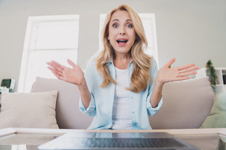 Photo of happy amazed crazy businesswoman have online meetings hear unexpected news information...