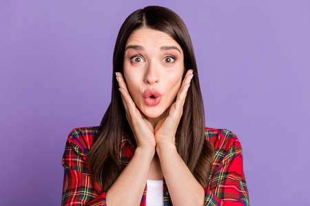 Photo of impressed brunette hairdo young lady hands face wear red shirt isolated on purple color...