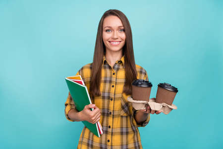 Portrait of charming satisfied lady hold coffee toothy smile look camera isolated on bright blue...