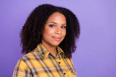 Photo of young positive afro american happy woman smile good mood business isolated on violet color backgroundの写真素材