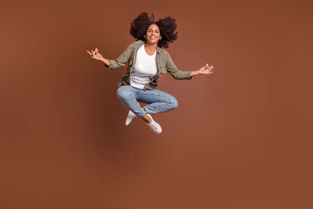 Full body photo of cheerful attractive girl hands fingers meditate look camera isolated on brown...