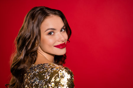 Turned photo of happy pretty young woman smile good mood christmas face isolated on red color...
