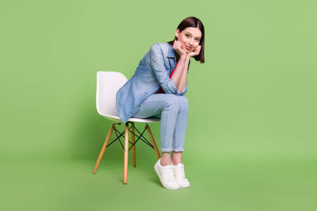 Full size profile side photo of young attractive girl happy positive smile sit stool isolated over...