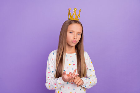 Photo of naughty doubtful princess lady count fingers wear crown dotted pajama isolated violet color backgroundの写真素材