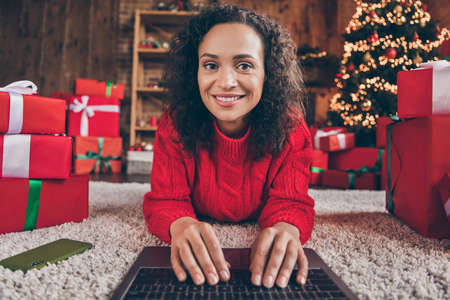 Photo of positive cheerful lady work laptop look web camera typing email wear pullover in decorated...