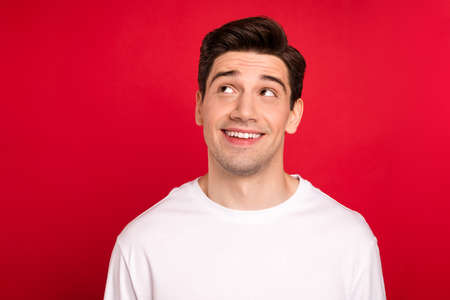 Photo portrait brunet wearing casual t-shirt happy looking copyspace isolated bright red color...