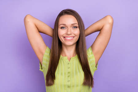 Portrait of attractive cheerful straight-haired girl resting good mood day isolated over purple violet color backgroundの写真素材