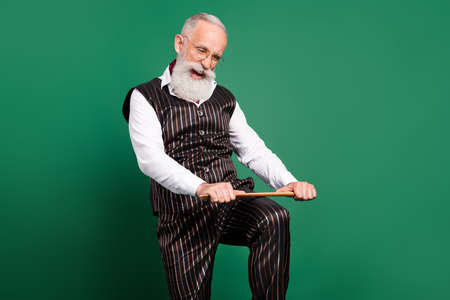 Photo of annoyed aggressive professor scream break pointer wear specs striped suit scarf on green...
