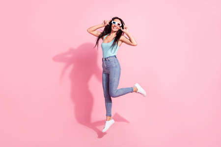 Full length body size view of attractive cheerful girl jumping wearing 3d specs pastime good mood...