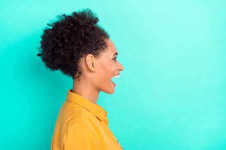 Profile side view portrait of attractive cheerful girl good news reaction copy space isolated over...