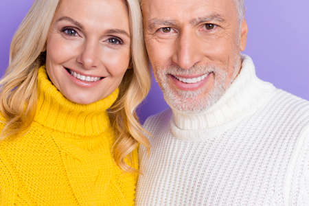 Photo of sweet shiny senior husband wife dressed knitwear sweaters hugging smiling isolated violet...