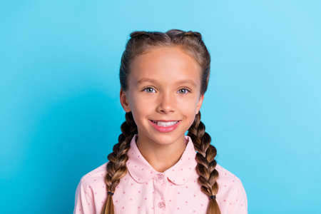 Photo of young attractive girl happy positive toothy smile stomatology isolated over blue color...