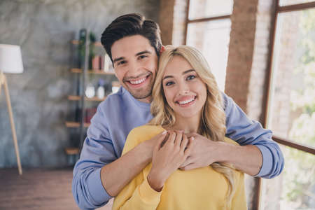 Photo of young cheerful couple happy positive smile spouses romance embrace love girlfriend...