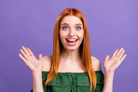 Photo of excited charming young woman dressed off-shoulders blouse rising arms open mouth isolated...