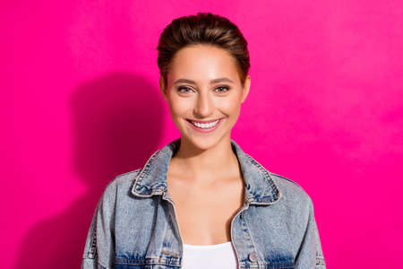 Photo of young happy positive woman smile good mood enjoy wear jeans isolated on pink color...