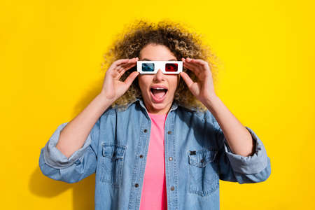 Photo of surprised lady imax movie special effects reaction wear 3d glasses jeans shirt isolated...