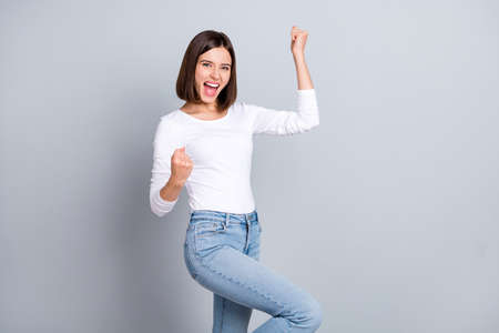 Photo of hooray bob hairstyle young lady yell wear white sweater jeans isolated on grey color...