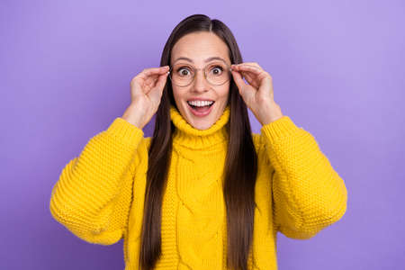 Photo of funky amazed pretty lady stare gaze big sale on black friday wear mustard sweater isolated...