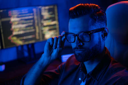Photo of clever smart tester arm touch spectacles midnight coworking research business center inside