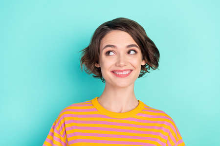 Portrait of attractive cheerful curious brown-haired girl overthinking copy space isolated over...
