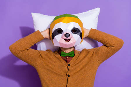 Top above high angle view photo of young man hands behind head red panda isolated over purple color backgroundの写真素材