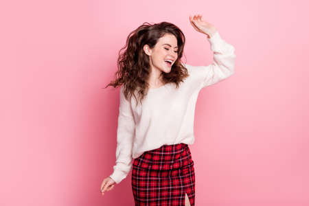 Photo of young attractive girl excited happy positive smile wavy hair isolated over pink color...