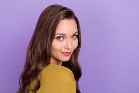 Profile photo of curly hairstyle satisfied young person look camera isolated on violet color backgroundの写真素材