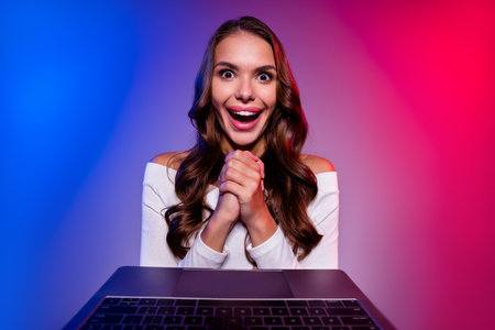 Photo of glad lady look webcam rejoice bet attainment prize wear white shirt isolated neon gradient color backgroundの写真素材