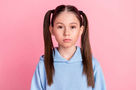 Portrait of nice attractive content cute serious preteen girl wearing cozy clothes isolated over...