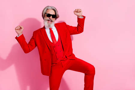 Photo of excited crazy handsome man rejoice dancing nightclub feel young isolated on pink color...