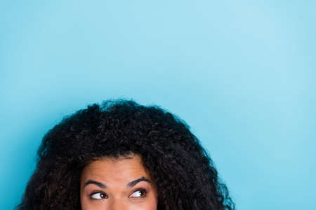 Cropped photo of curious thoughtful dreamy inspired lady look up empty space isolated blue color...