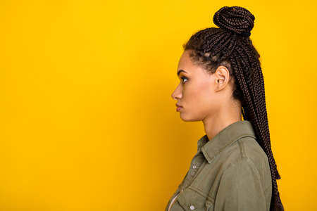 Photo portrait side profile view of african american woman looking at blank space isolated on vivid...