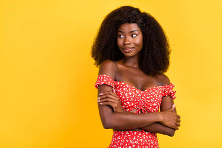 Photo of tender winsome lady with naked shoulders look copyspace dreaming summer season isolated on yellow color backgroundの写真素材