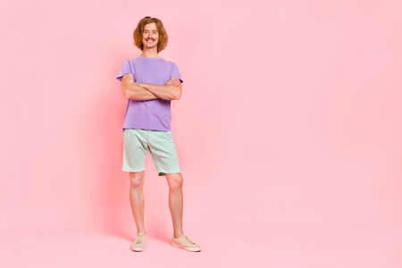Full length body size view of attractive content cheerful funky guy folded arms isolated over pink...