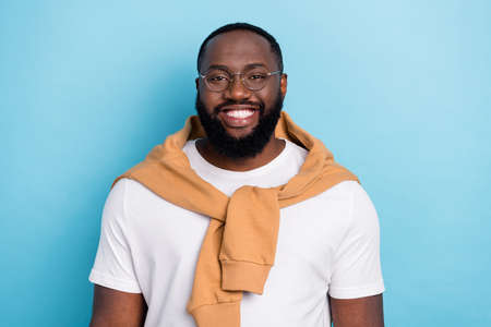Photo of cheerful positive business man beaming smile wear white t-shirt jumper front-tie isolated...