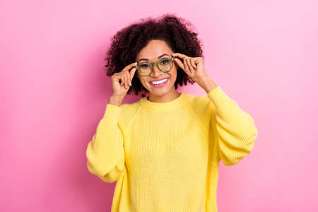 Photo of pretty funky woman dressed kitted pullover arms glasses smiling isolated pink color...