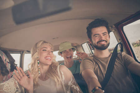 Photo of adventurous youngsters enjoy carefree auto journey wear casual outfit nature seaside beach...