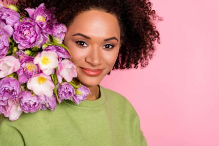 Cropped photo of young pretty lady blossom spring fresh bunch of flower isolated over pink color...