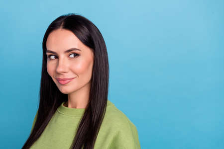 Photo of young charming young business lady look empty space thinking find solution isolated on blue color backgroundの写真素材