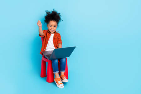 Full body photo of brunette hair little funny intelligent girl studying online pass test a-grade...