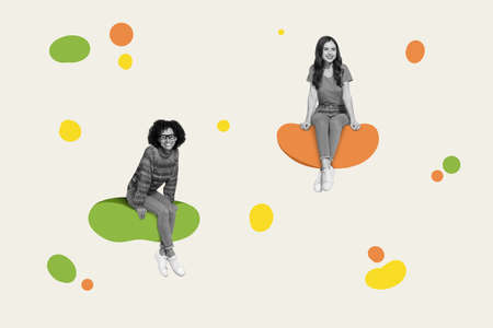 Creativity art composition of two ladies sit spots zero gravity fly isolated over pastel color backgroundの写真素材