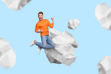 Surreal composition of clever man fist up great conclusion crumple paper around isolated blue pastel...