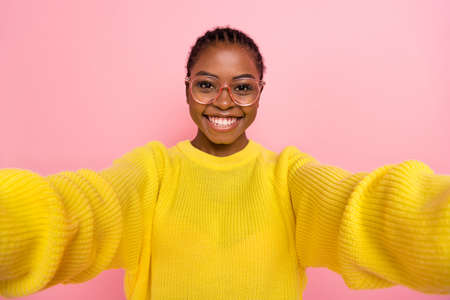 Portrait of charming positive girl take selfie toothy smile good mood isolated on pink color...