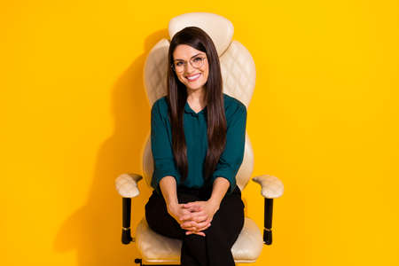 Photo of young pretty lady smart eyewear economist expert investor isolated over yellow color...