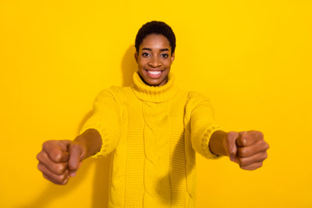 Photo of funky funny cheerful trans person driving auto training to ride wear knitted sweater...