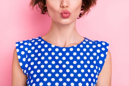 Cropped photo of girlfriend young brunette lady blow kiss wear blue top isolated on pink color backgroundの写真素材